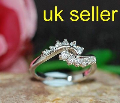 Newly listed created tiny diamond crossover White GP ring size N 7
