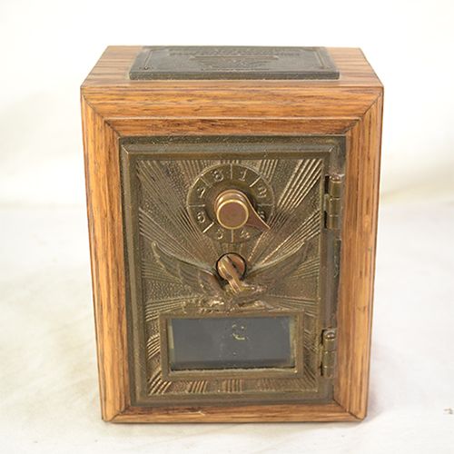 this is a previously owned vintage post office lock box bank safe the