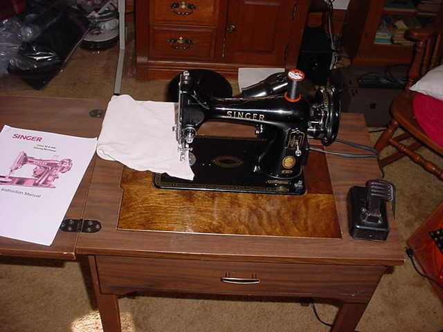   Singer 99K Sewing Machine and Cabinet Buttonhole Attachment