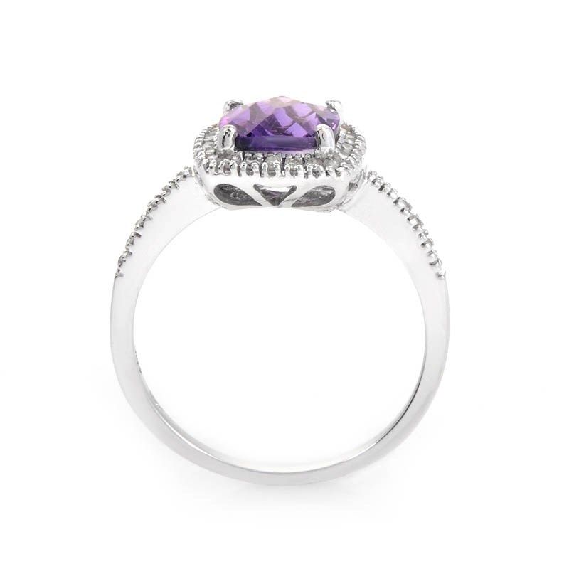  cut amethyst. Lastly, the bezel and shanks are set with ~.15ct of