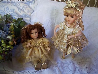 Collectors Choice (2) Porcelain Dolls Ballerina And Sitting Musical